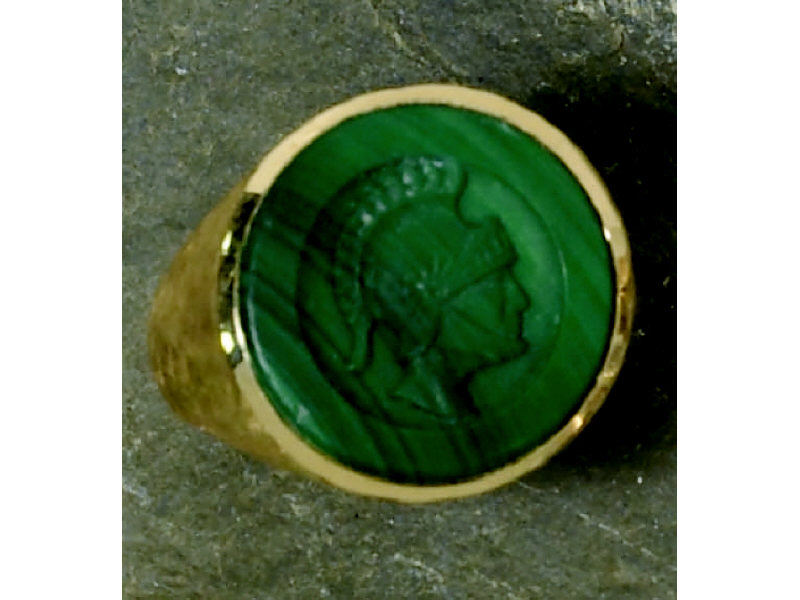 Appraisal: MALACHITE MAN'S RING K yellow gold with intaglio cut knights