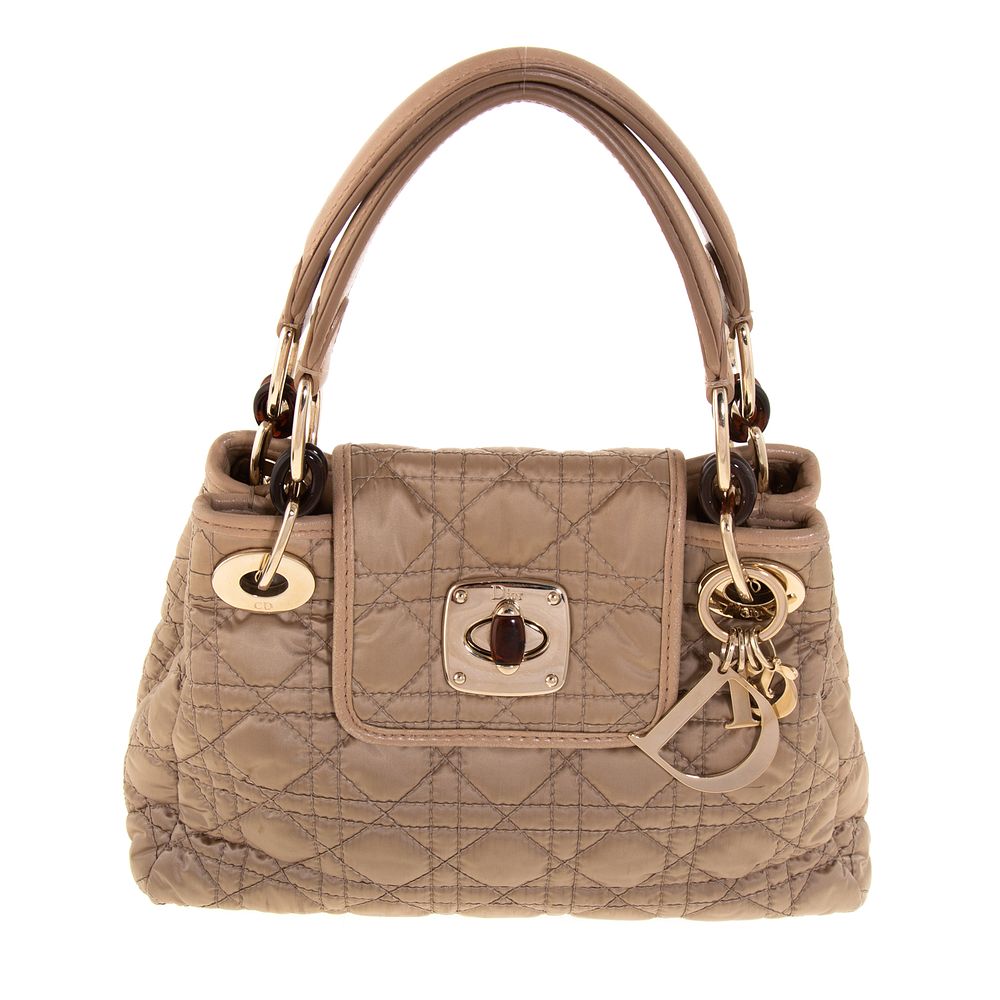 Appraisal: A Christian Dior Nylon Charming Lock Bag A gold nylon