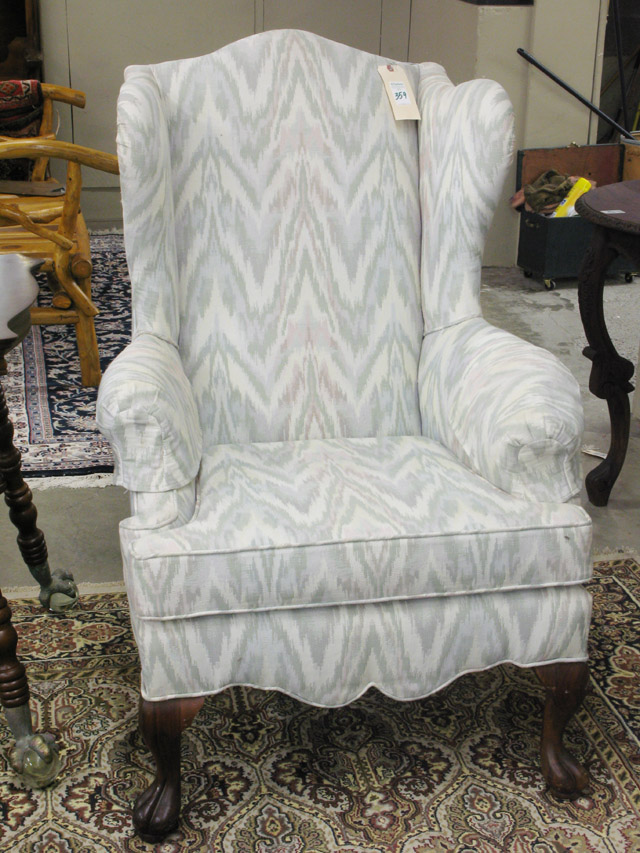 Appraisal: CHIPPENDALE STYLE WING-BACK ARMCHAIR American th century standing on four