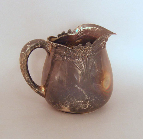 Appraisal: Sterling silver water pitcher by Theodore B Starr New York