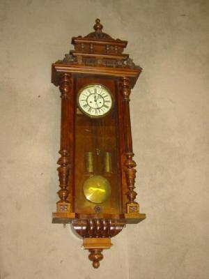 Appraisal: A VIENNA WALL CLOCK by Gustav Becker the weight driven