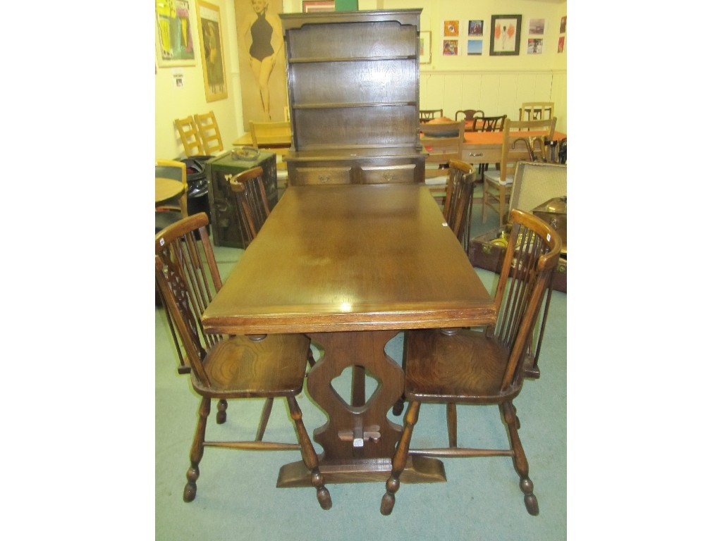 Appraisal: Kitchen dresser refectory style dining table four spindle back chairs