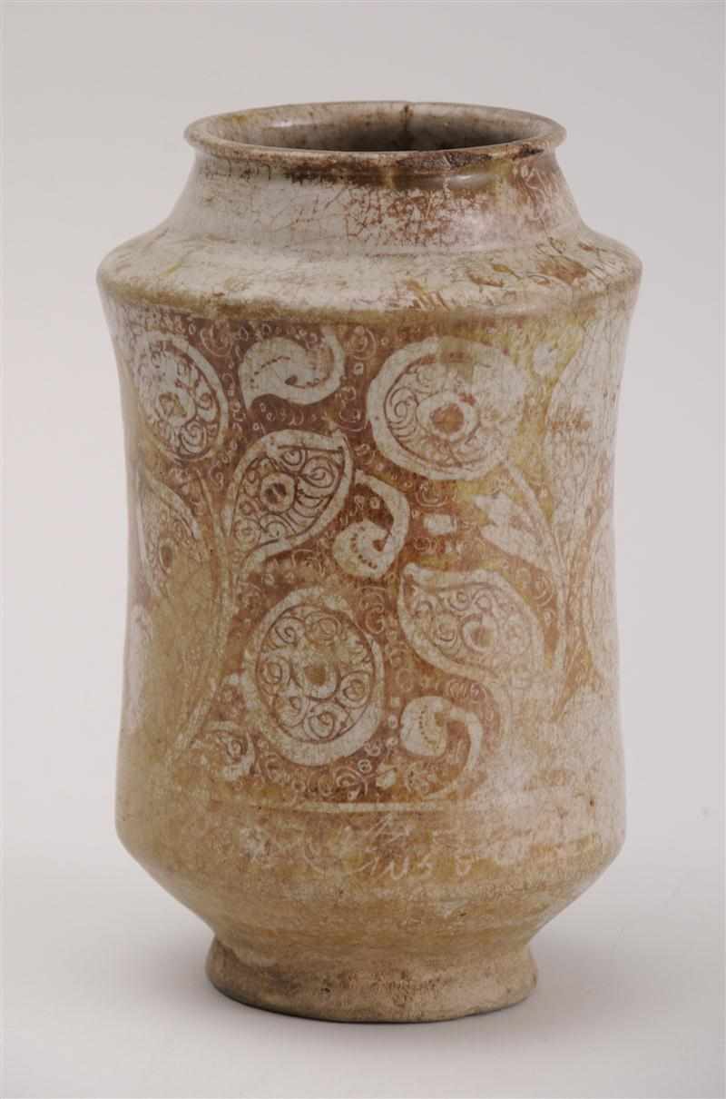 Appraisal: PERSIAN LUSTER-GLAZED POTTERY JAR The slightly waisted cylindrical body with