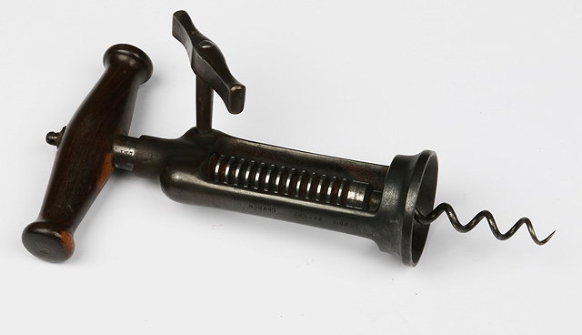 Appraisal: A TWO PILLAR LUND PATENT LONDON RACK CORKSCREW with turned