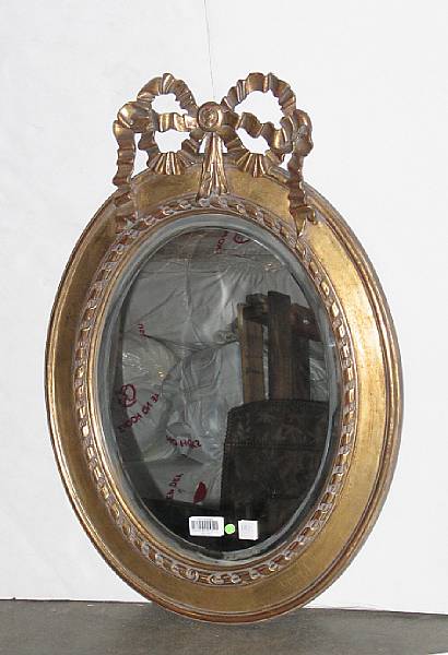 Appraisal: A Victorian style giltwood mirror diameter in