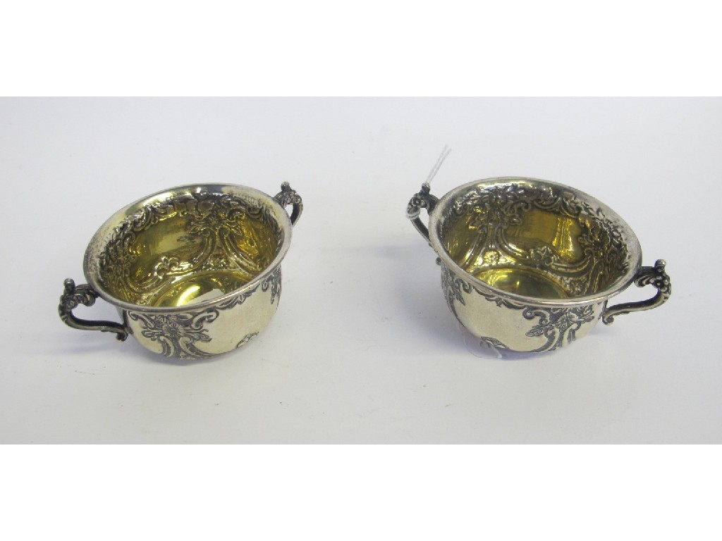 Appraisal: Pair of Edwardian silver double handled cups Birmingham