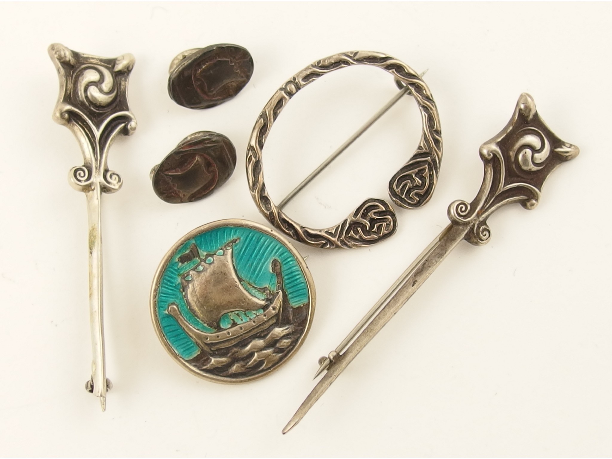 Appraisal: An Alexander Ritchie enamelled Viking long ship brooch together with