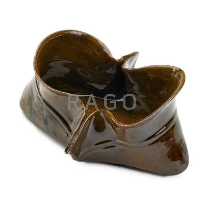 Appraisal: GEORGE OHR Small pinched pouch-shaped vessel mottled amber glaze Biloxi