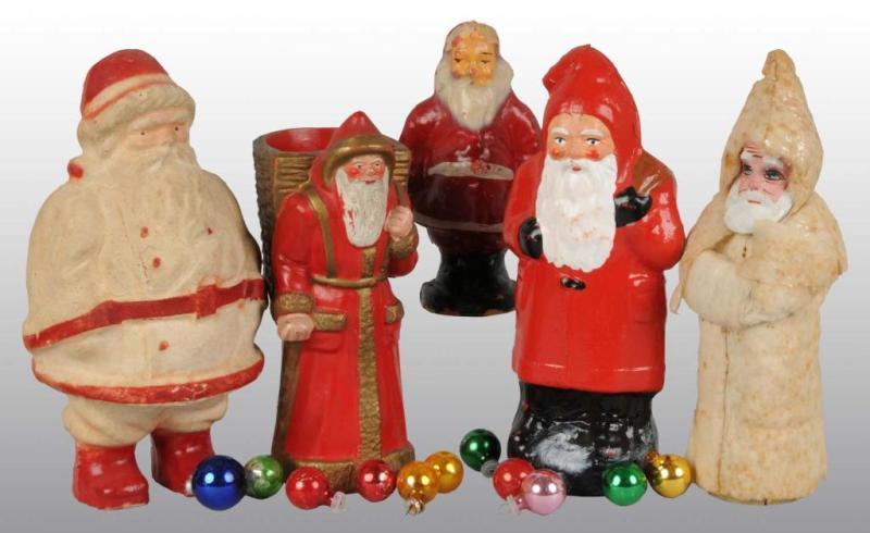 Appraisal: Lot of Christmas Santa Figures Condition Very Good Size Largest