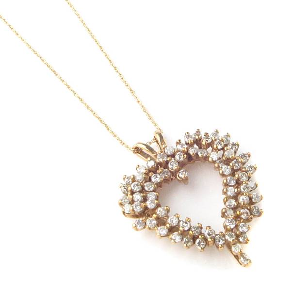 Appraisal: A diamond and k gold heart pendant with chain set