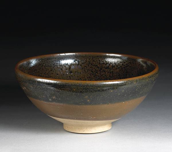 Appraisal: A large Cizhou type black glazed stoneware bowl with 'oil