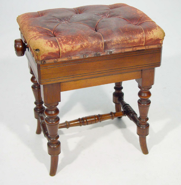 Appraisal: Victorian mahogany adjustable piano stool with buttoned ox blood leather