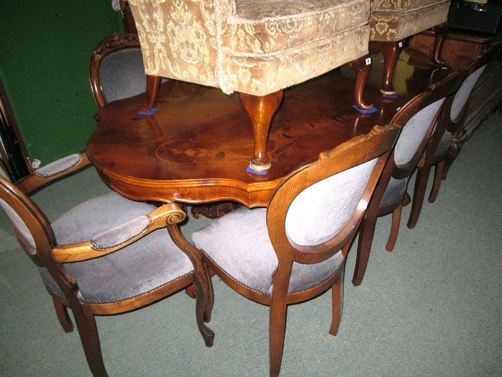 Appraisal: Italian reproduction twin pedestal dining table and eight chairs