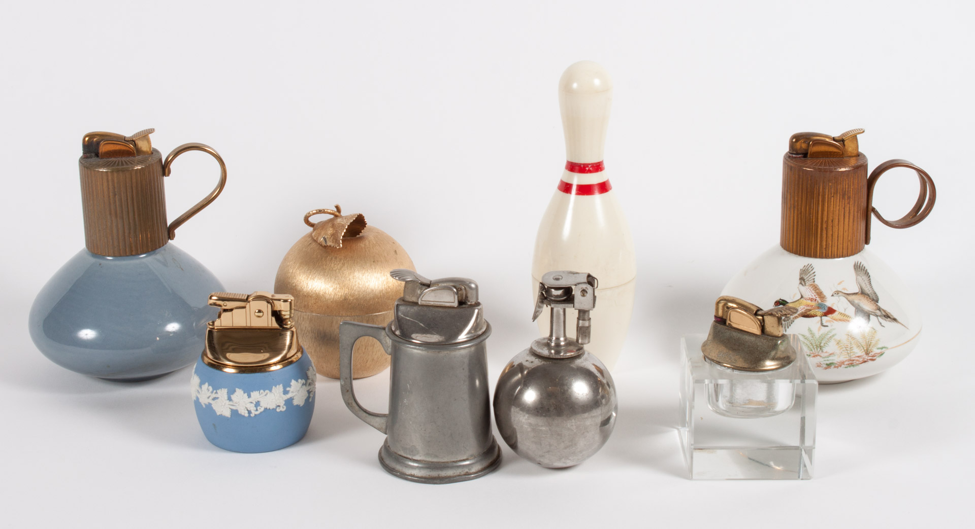 Appraisal: Eight novelty and desk cigarette lighters s- s including bowling