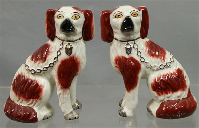 Appraisal: Pr Staffordshire white rust spaniels black gilt trim craquelure otherwise