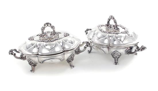 Appraisal: Pair Elkington Co silverplate covered entree dishes dated Gothic Revival