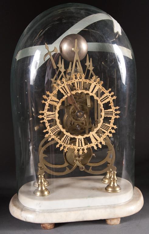 Appraisal: Victorian brass skeleton clock on marble base with glass dome