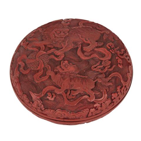 Appraisal: Chinese Lions and Qilin Circular Carved Cinnabar Lacquer Box Qing