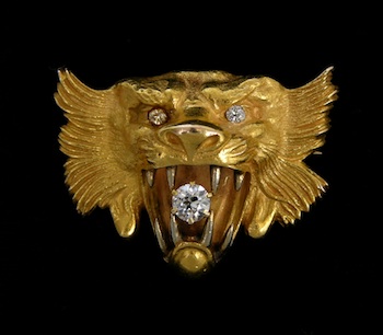 Appraisal: A Lion Head Form Pendant Brooch with A Diamond A