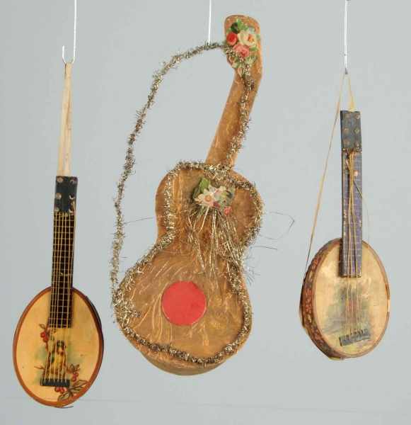 Appraisal: Lot of Cardboard Instruments Description Hanging candy containers Some wear