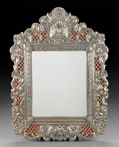 Appraisal: A Baroque style sterling mirror The rectangular plate within a