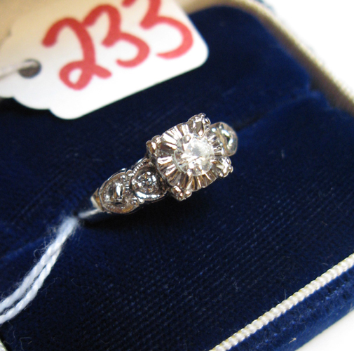 Appraisal: DIAMOND AND FOURTEEN KARAT WHITE GOLD RING centered and raised