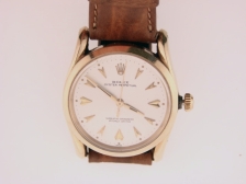 Appraisal: Rolex Bombay automatic K round screwback with gold Rolex buckle