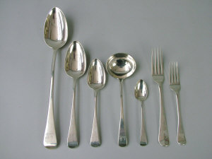 Appraisal: A matched George III silver hanoverian flatware service comprising basting