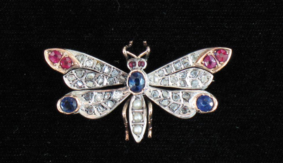 Appraisal: A DIAMOND-SET BROOCH in the form of a butterfly the