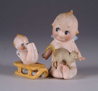 Appraisal: PAIR OF RARE GERMAN KEWPIES - t Kewpie with a