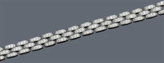 Appraisal: DIAMOND BRACELET White gold Casual-elegant bracelet of slightly convex brick-patterned