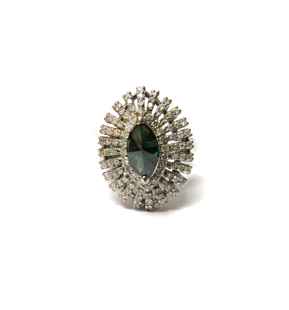 Appraisal: A white gold diamond and green tourmaline set marquise shaped