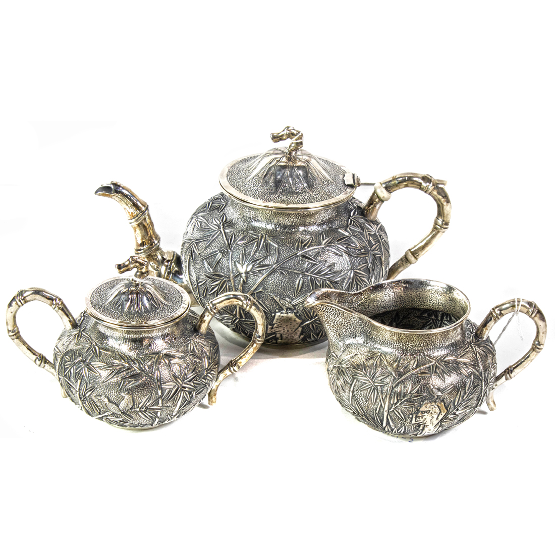 Appraisal: CHINESE THREE-PIECE EXPORT SILVER TEA SET BY WANG HING Chinese