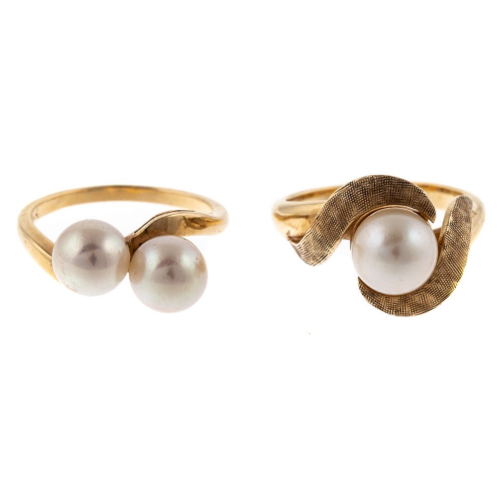 Appraisal: A Pair of Pearl Bypass Rings in K K yellow