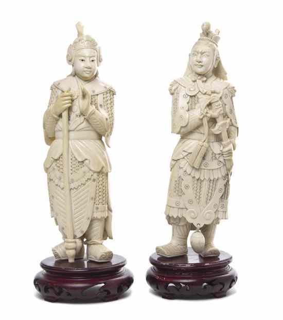 Appraisal: A Pair of Chinese Carved Ivory Figures of Warriors both