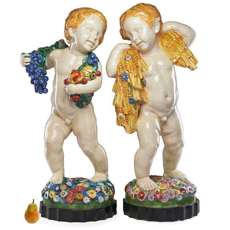 Appraisal: WIENER KUNSTKERAMIK Two large putti Condition Report Autumn chips and