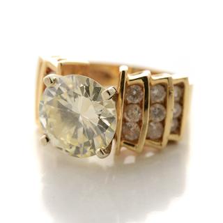 Appraisal: Diamond k Yellow Gold Ring Featuring one round brilliant-cut diamond