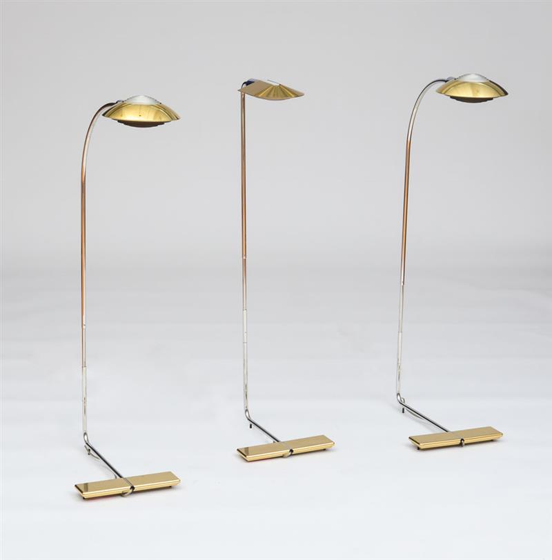 Appraisal: THREE CEDRIC HARTMAN FLOOR LAMPS Brass and stainless steel marked