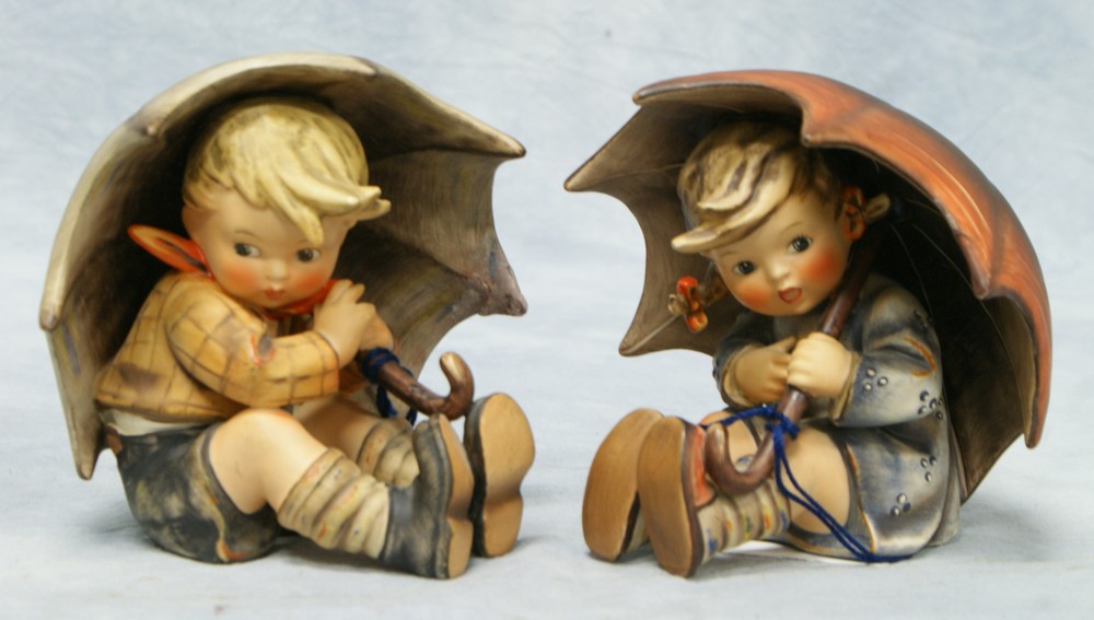 Appraisal: Hummel figurines Umbrella Girl Hum B Umbrella Boy Hum A