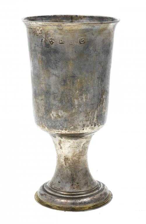 Appraisal: A GEORGE I COMMUNION CUP the beaker shaped bowl slightly