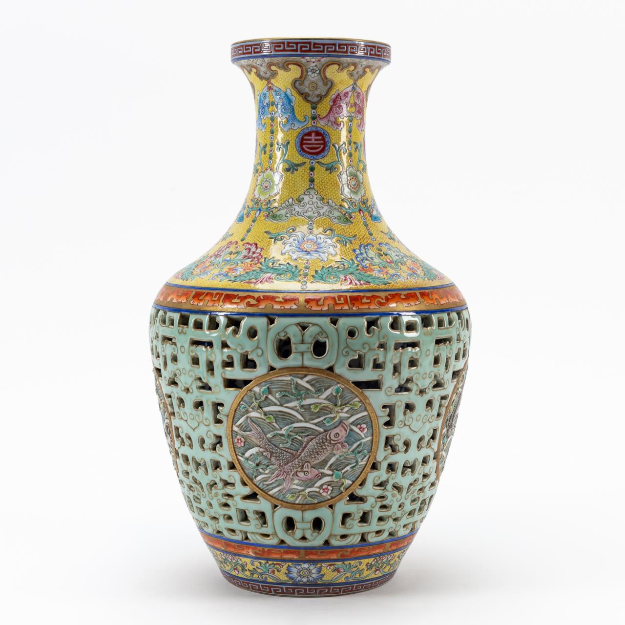 Appraisal: CHINESE YANGCAI JIQINGYOUYU RETICULATED VASE Chinese Yangcai Jiqingyouyu reticulated vase