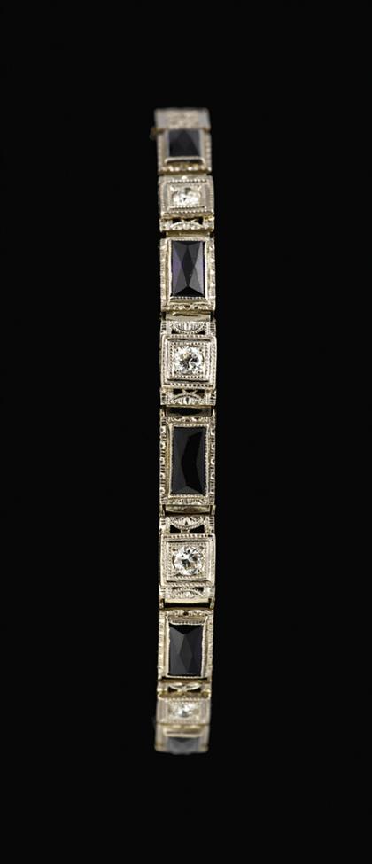 Appraisal: karat gold platinum topped sapphire and diamond bracelet art deco