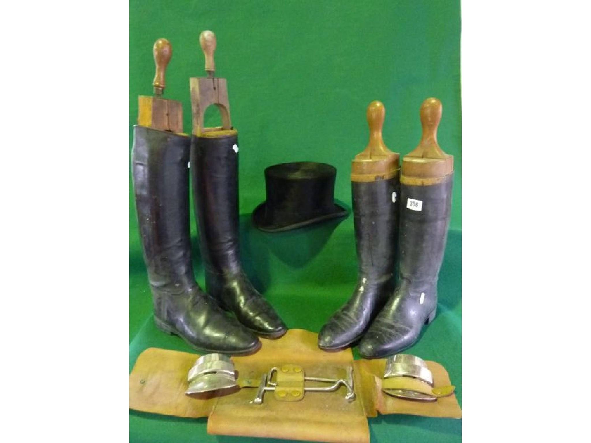 Appraisal: Two pairs of vintage leather riding boots complete with trees