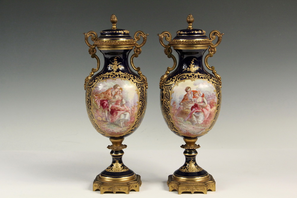 Appraisal: PAIR OF SEVRES STYLE PORCELAIN VASES AND COVERS - Ormolu