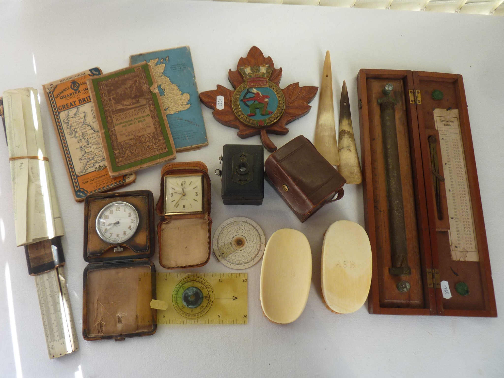 Appraisal: A miscellaneous collection to include a cased navigational rule marked