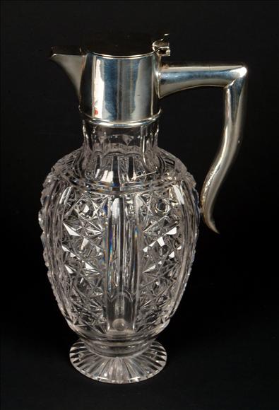 Appraisal: A silver mounted cut glass claret jug by J Sherwood