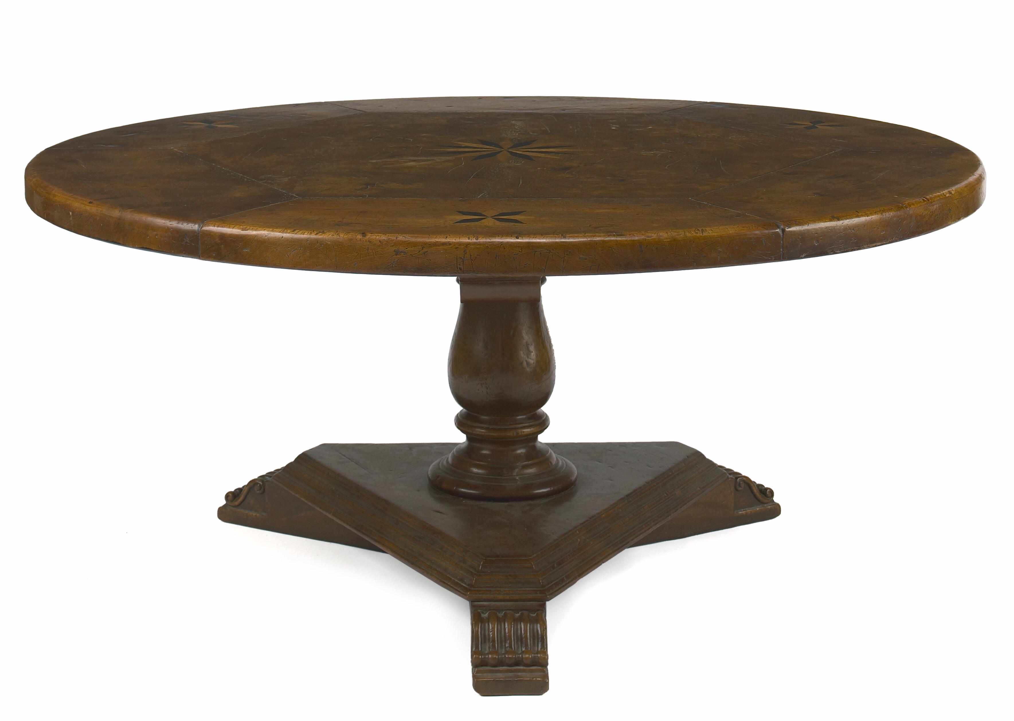 Appraisal: An Italian Baroque style walnut and elm circular dining table