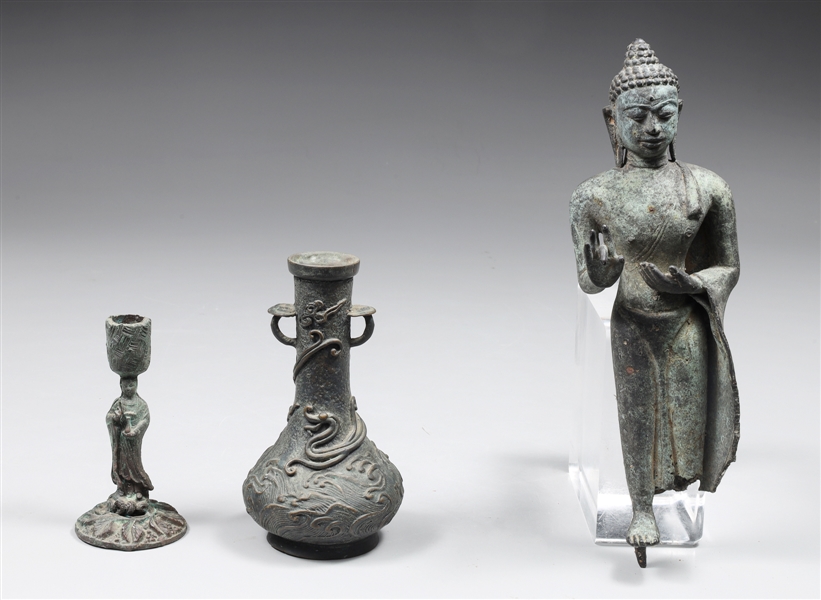 Appraisal: Group of three Chinese bronze figures standing bronze figure missing