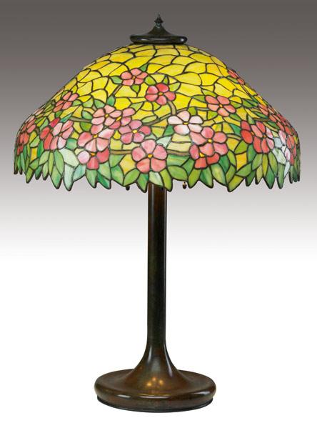 Appraisal: UNIQUE Tall table lamp with a leaded-glass shade in a