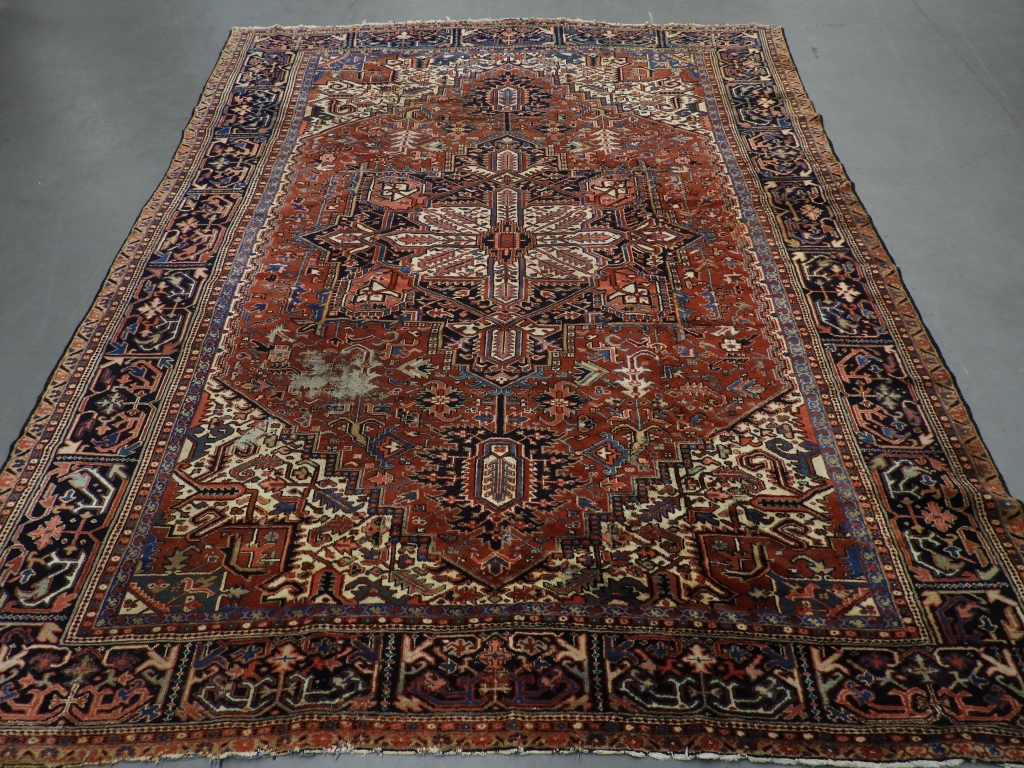 Appraisal: PERSIAN HERIZ ROOM SIZE WOOL CARPET RUG Persia Circa Central